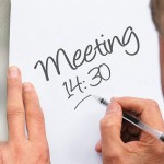 How often should we conduct a performance review meeting?